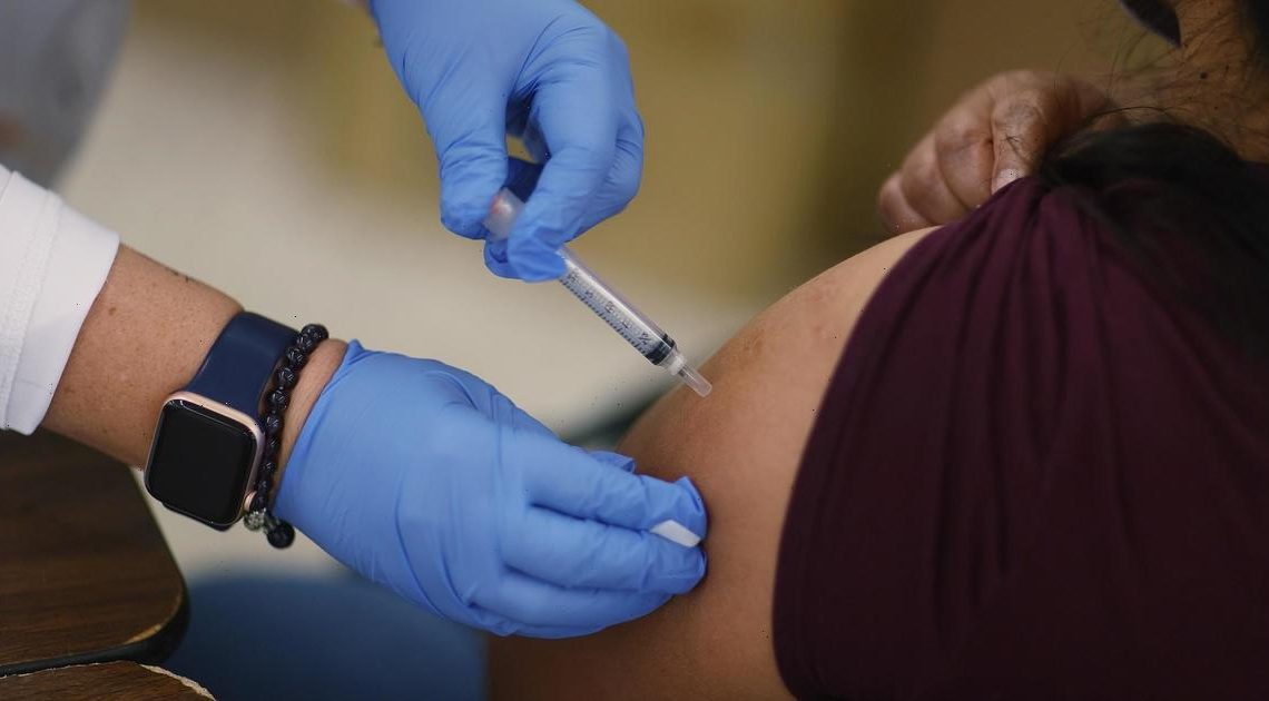 Half of U.S. adults are now fully vaccinated, CDC says