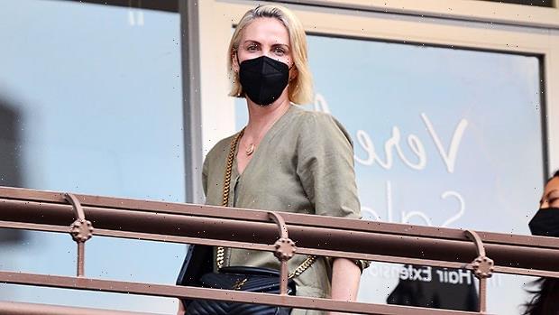 Charlize Theron Glows In A Green Jumpsuit On Rare Outing With Daughters Jackson, 9 & August, 5 — See Pics