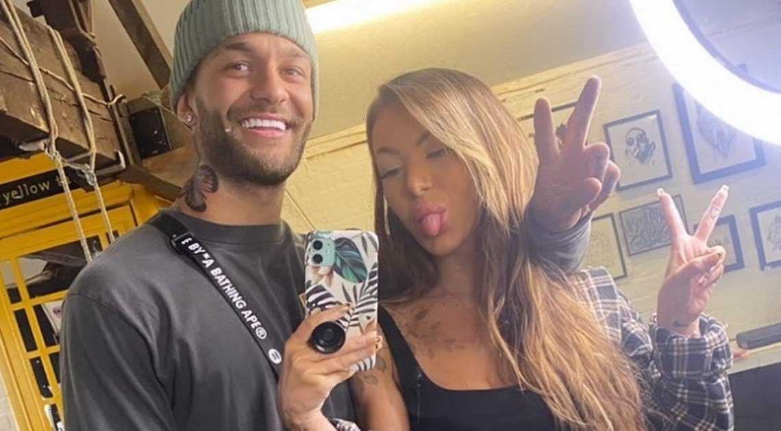 Love Island’s Abigail Rawlings all smiles with Dale as she gives him new tattoo