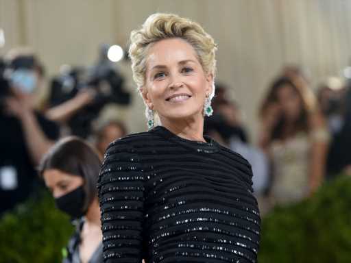 Sharon Stone Posed in a Slinky Black Bathing Suit For This Red-Hot Reminder to Prioritize Self-Care