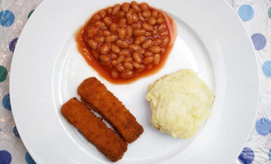 Woman makes an epic dino nugget and baked bean volcano for her tea but people are horrified at one thing