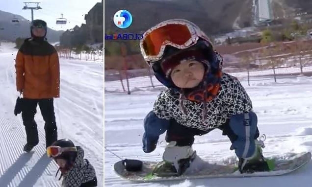 Baby, 11 months, takes internet by storm as she masters snowboarding
