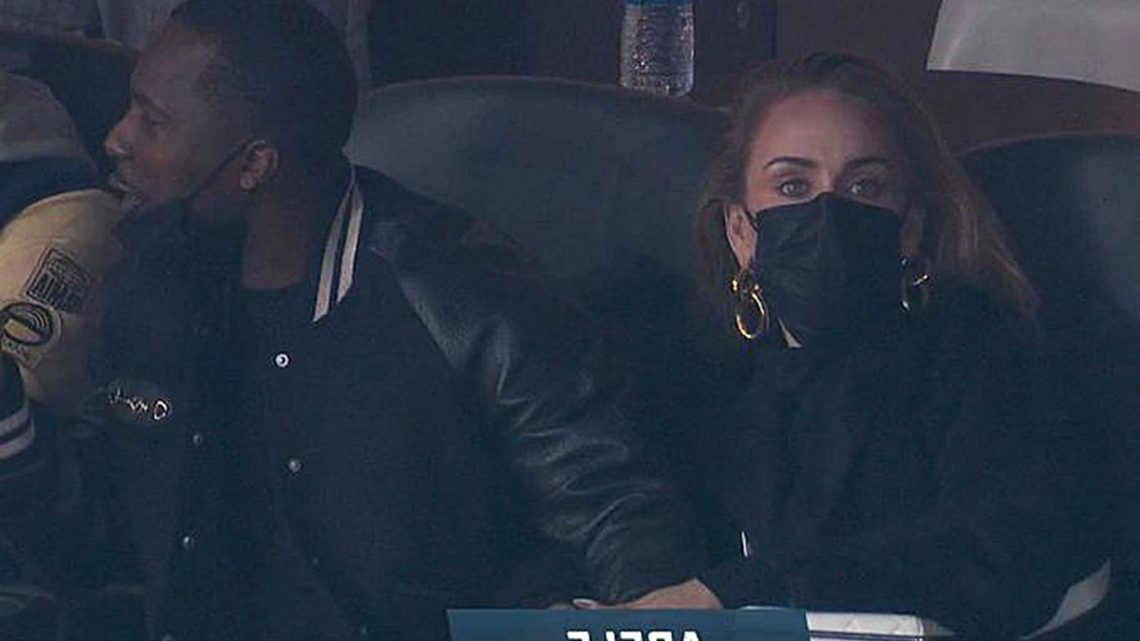 Adele and boyfriend Rich Paul hold hands at LA Chargers game