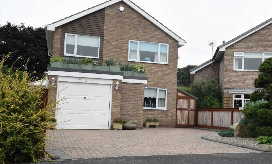 Ordinary-looking Yorkshire house hides incredible £40,000 Japanese garden at the back with koi carp pond and tea house