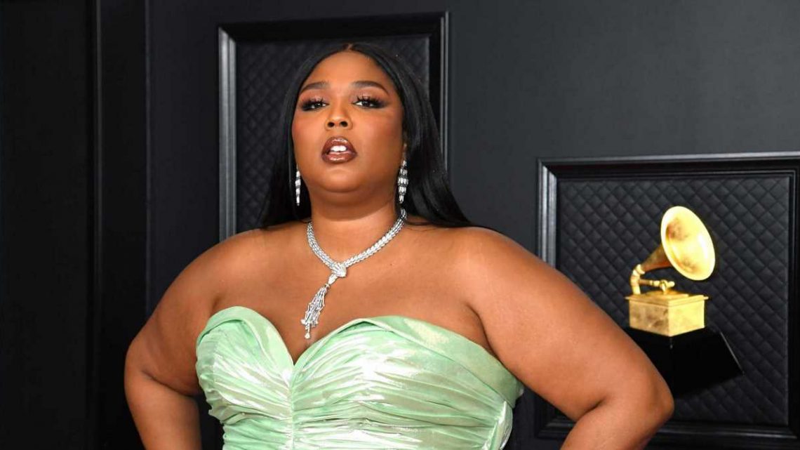 You’ll Be Feeling Good as Hell Once You Shop Lizzo’s Hot Pink Vacay Look