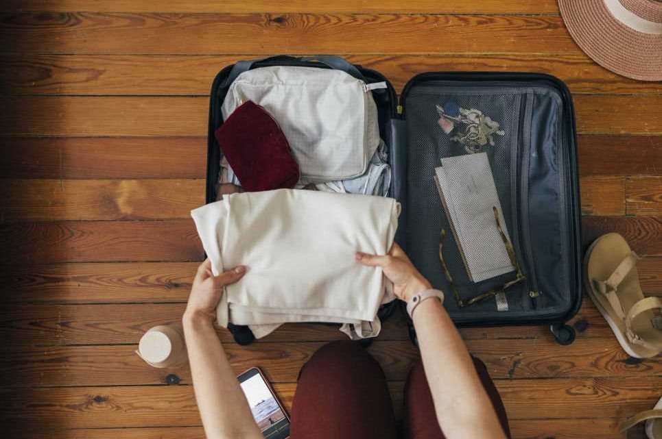 I’m a packing expert and you should both roll AND fold when going on holiday – depending on your clothes | The Sun