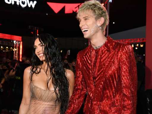 Megan Fox & Machine Gun Kelly Remind Everyone They Love Blood With Coordinating Red Outfits During Milan Fashion Week