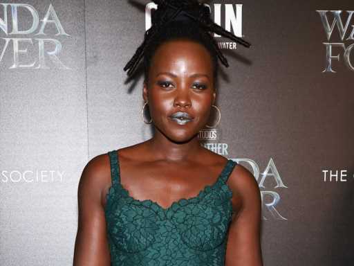 Lupita Nyong'o’s Daring & Lace Green Mini-Dress May Be One Of Her Most Striking Looks Yet