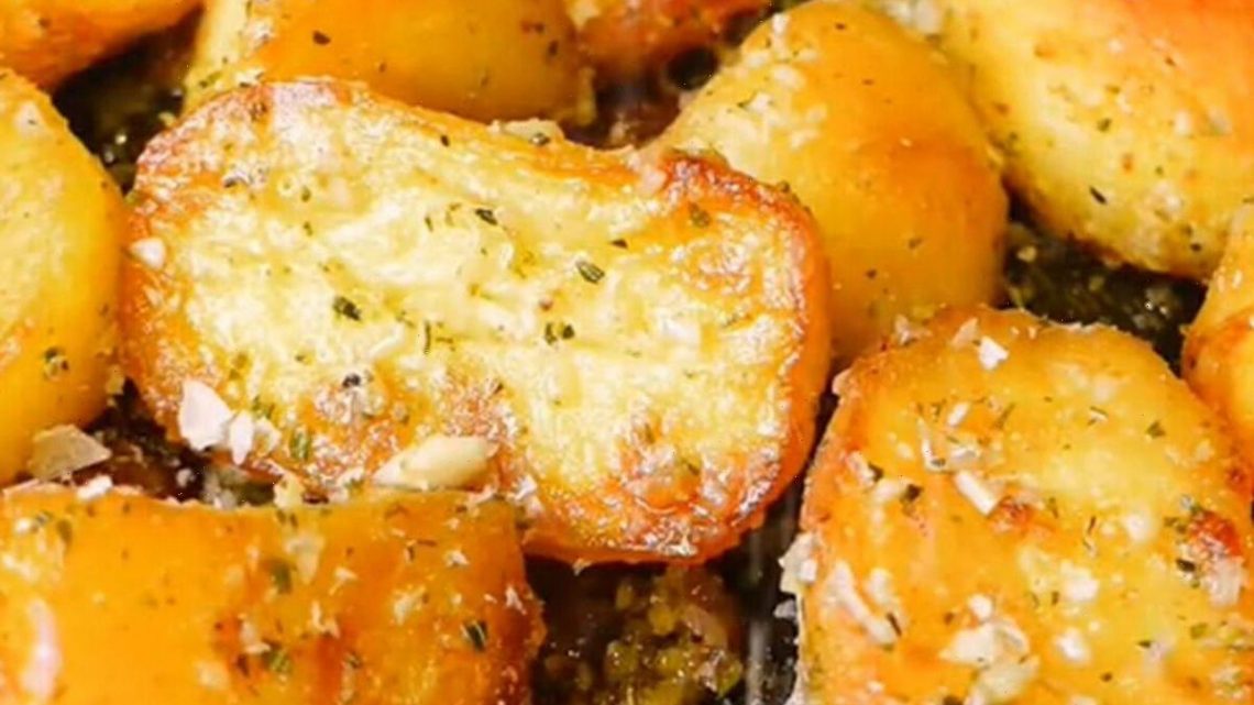 Garlic, shallot and herb wine reduction roast potatoes