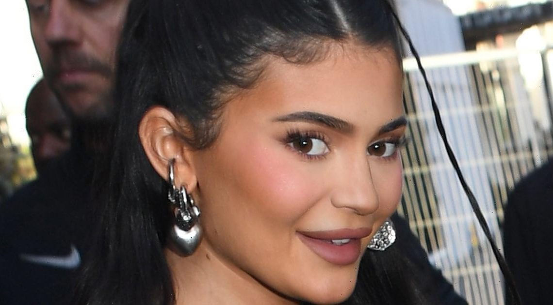 Kylie Jenner Wears a Plunging Neckline and Thigh-High Slit on Christmas Eve