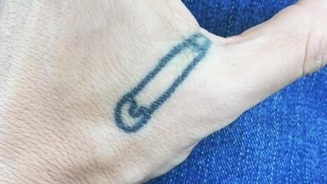 Woman shows off her ‘meaningful’ hand tattoo before revealing its double meaning – but even alone people say it's dodgy | The Sun