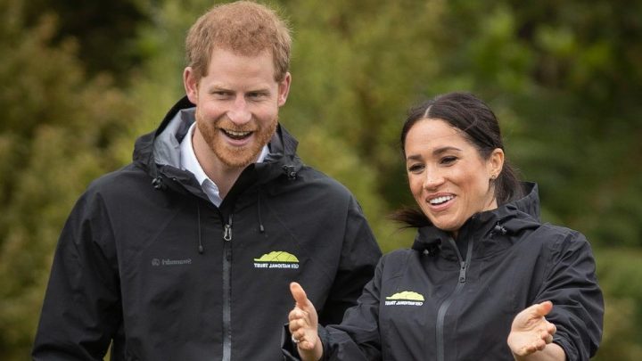 Prince Harry and Meghan Markle giggle at Archie in the garden of their £11m home