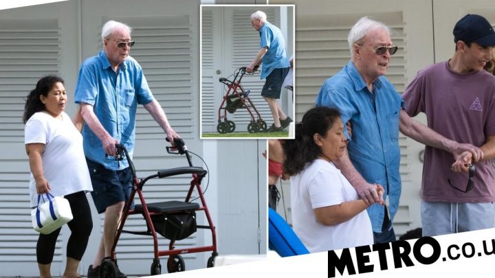 Sir Michael Caine uses walking frame as he soaks up the sun on Barbados holiday