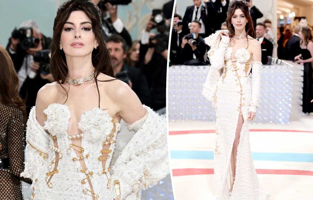 Anne Hathaway gives ‘90s energy in a Versace safety pin dress at Met Gala 2023