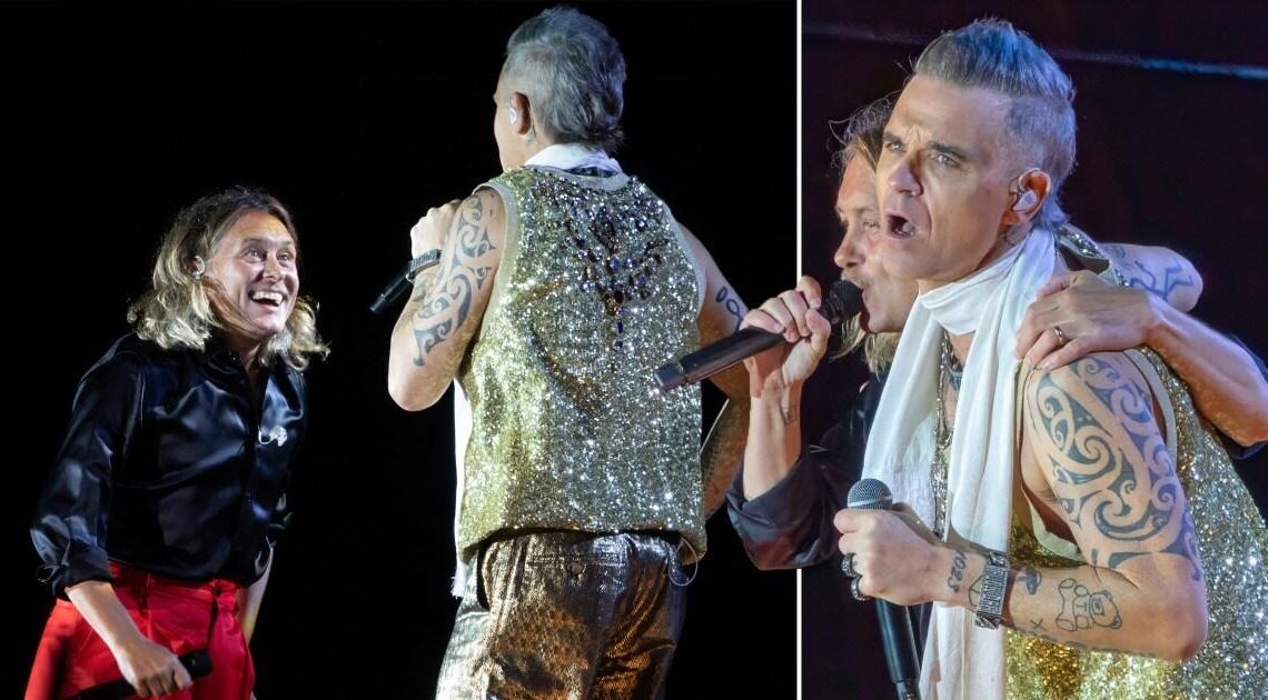 Robbie Williams shares emotional stage reunion with Take That's Mark Owen